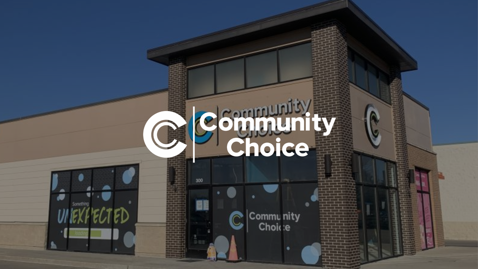 A member being helped at a Community Choice Credit Union branch counter